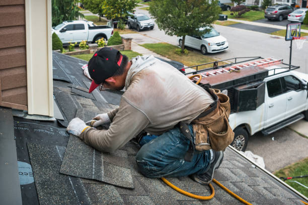 Professional Roofing technician working in Bowen, IL